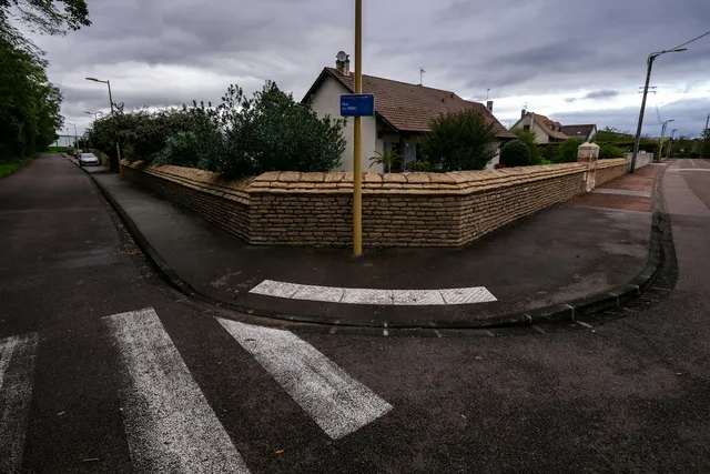 A quiet street corner, the ordinary junction where a rear tyre is dragged sideways for three feet